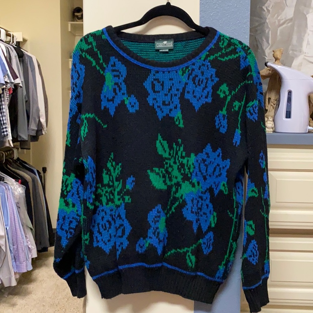 Soft black Sweater with blue floral accents
